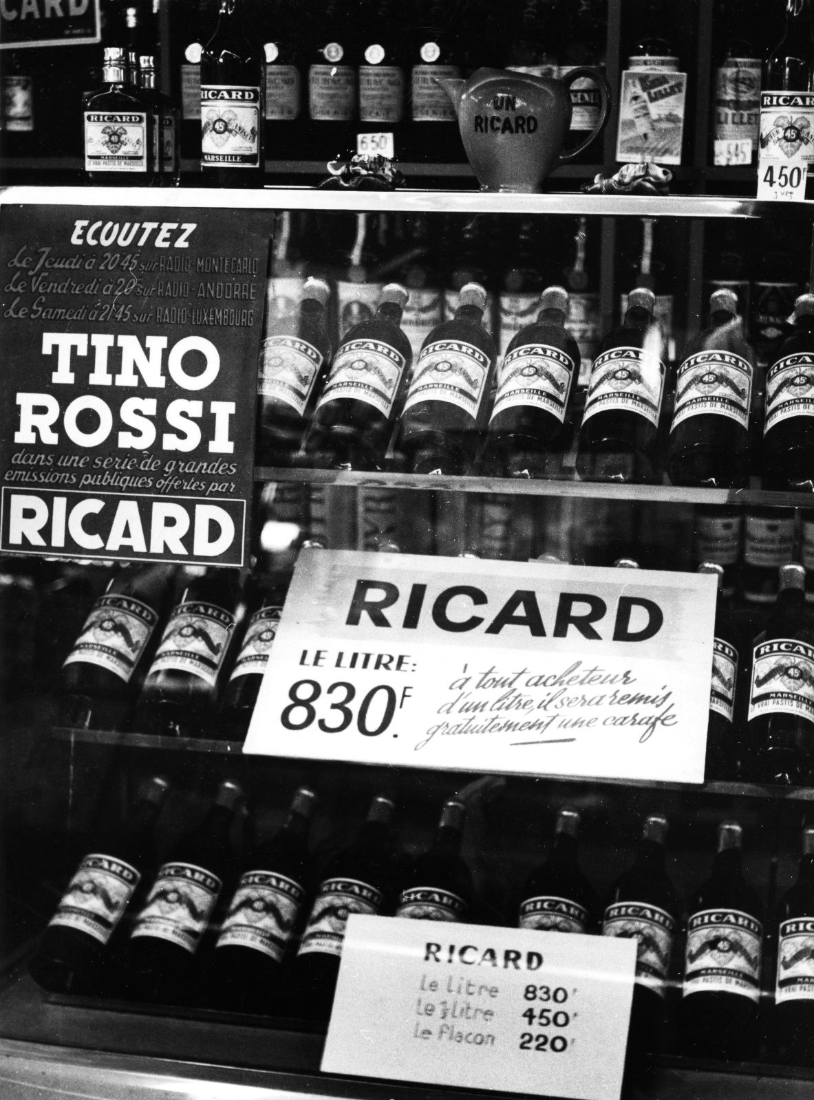 1952.07.01GrandMagasinDecreNantesStandRicardTinoRossiNum02